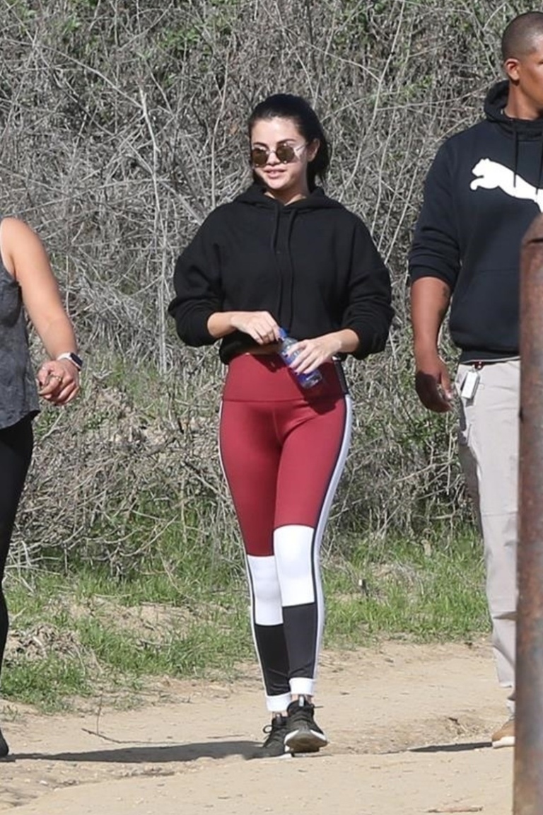 where to get Selena Gomez red black white leggings black hoodie trainers December 2018