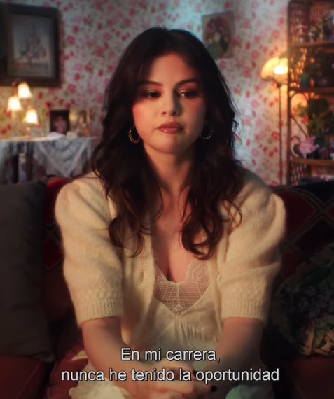 where to get all Selena Gomez outfits ivory lace dress cream short sleeve cardigan gold hoops 15 September 2021 Photo Selena Gomez Artist Spotlight Stories